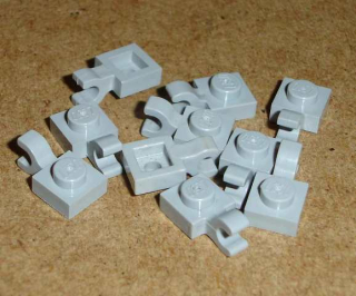 Lego 255169-X (6019, 61252) destička speciální 1x1 s klipem 10 ks POUŽITÉ
