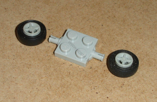 Lego 635256 (4600, 4624, 3139) náprava + 2 ks kolo 8 mm s pneu  POUŽITÉ