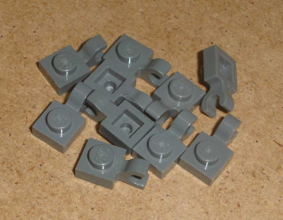 Lego 250130-X (6019, 61252) destička speciální 1x1 s klipem 10 ks POUŽITÉ