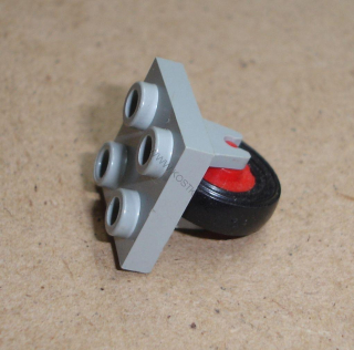 Lego 647330 (8c01) díl na letadlo podvozek 2x2 s kolem (red) POUŽITÉ