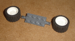 Lego 636271 (30157, 30285, 30648 / 89201) náprava + 2x kolo 18mm D. x 14mm s gumou 24 x 14 POUŽITÉ
