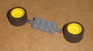 Lego 636276 (30157, 30285, 30648 / 89201) náprava + 2x kolo 18mm D. x 14mm s gumou 30.4 x 14 POUŽITÉ