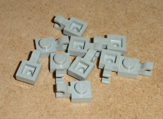 Lego 255690-X (6019) destička speciální 1x1 s klipem 10 ks POUŽITÉ