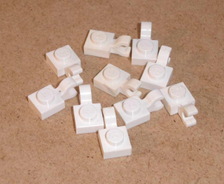 Lego 255173-X (6019, 61252) destička speciální 1x1 s klipem 10 ks POUŽITÉ