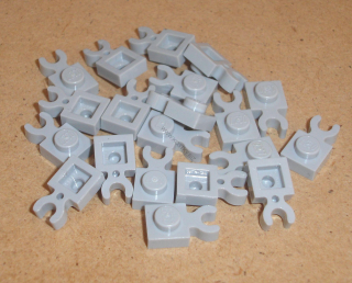 Lego 250196-X (4085) destička speciální 1x1 s klipem 20 ks POUŽITÉ