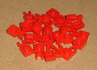 Lego 250208-X (4085) destička speciální 1x1 s klipem 20 ks POUŽITÉ