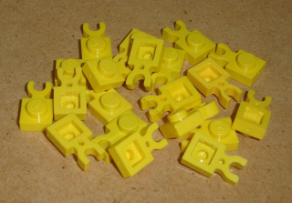 Lego 250210-X (4085c, 4085d) destička speciální 1x1 s klipem 20 ks POUŽITÉ