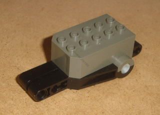 Lego 649530 (32283c01) podvozek, motor 9x4x2 1/3 (zpětné natahování) 1 ks POUŽITÉ