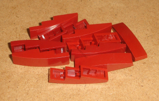 Lego 701244-X (61678) šikmá, zakulacená 4x1 10 ks POUŽITÉ