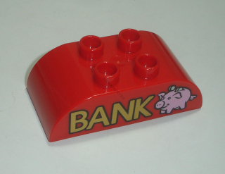 Lego Duplo D14927 (98223pb005) kostka 2x4 zakulacená červená s potiskem (nápis BANK s prasátkem) POUŽITÉ
