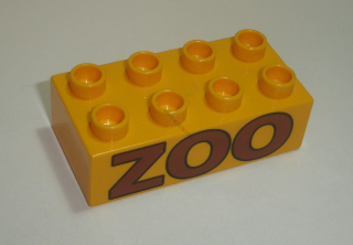 Lego Duplo D16050 (3011pb017) kostka 2x4 br. l. oranžová s potiskem (nápis "ZOO") 1 ks POUŽITÉ