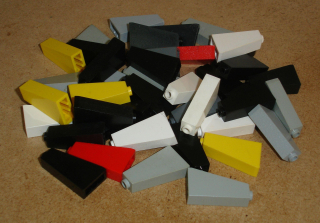 Lego 305273-X (4460a) šikmá 75 2x1x3 (horší stav, škrábance, zežloutlé) 41 ks POUŽITÉ