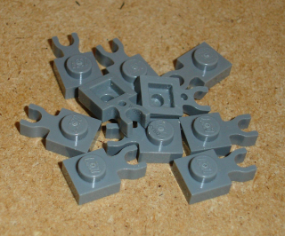 Lego 255790-X (4085b) destička speciální 1x1 s klipem 10 ks POUŽITÉ