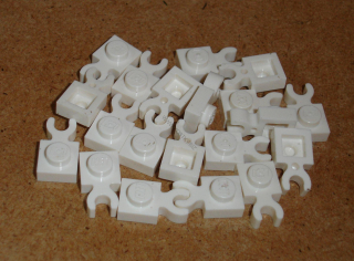 Lego 255374-X (4085d) destička speciální 1x1 s klipem 20 ks POUŽITÉ