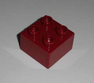 Lego Duplo D10064 (3437) kostka 2x2 tm. červená 1 ks POUŽITÉ